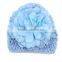 baby knitted hat with big pretty flowers