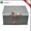 Luxury white cardbaord folding gift box with ribbon closure