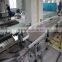 High friction slat chain conveyor line with anti-slip rubber for uplifting material handling