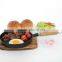 Mini round cast iron pizza pan with wooden handle