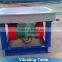 China manufacture vibrating table for bagged products