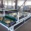 Semi--automatic flute laminator machine