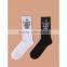 Skateboarding in their couples socks in tube socks wholesale socks