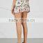 Wholesale Women Apparel Printed Ruffled Trims Ivory Cotton Mini Skirt(DQE0350SK)