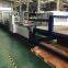 Industrial Carton Folder Gluer with Integrated Strapping Unit
