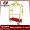 Used hotel luggage cart in bronze plated