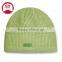 Different kinds of green knit beanie hats