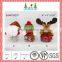 Plush doll with tree shaped christmas candy bottle