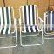Folding tubular metal chair