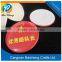yellow red green and bule tin badges