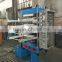 Rubber tile press with moulds