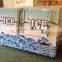 Upright ice merchandiser with fan cooling system