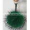 Factory direct supply raccoon fur pom poms for keychain/raccoon fur pom poms/real raccoon fur