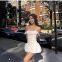 French style chic little girl style wrap-around sleeveless dress for women, slimming waist, shaping figure, showing off slimming curves, pleated A-line short skirt in solid color.