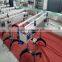 High friction slat chain conveyor line with anti-slip rubber for uplifting material handling