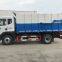 Hook arm garbage truck