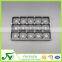 Rectangular black plastic blister chocolate box with 15 round holes