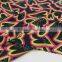export surplus garments in delhi red yellow heart pattern on black polyester milk fiber Spandex Fabric