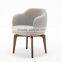 Soft dining armchair with wooden base HDAC1066