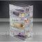 clear perspex box with drawers