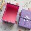Custom purple gift box with ribbon