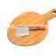 Bamboo Chopping Block Cutting Board with a Knife attached to the Board with Magnet and a Handle to Hold and a Hole to Hang