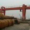 Boxed beam double girder gantry crane portal with saddles and cantilevers