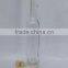 cylinder shaped clear glass vodka bottle with cork stoppers
