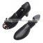 black plastic adjustable shoe stretcher