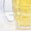 Machine made clear glass beer mug with handle