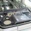 Double-station hot riveting machine for automotive door panels