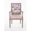 Antiqued carved popular style dining room table and chair