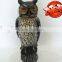 cute smart garden owl with plastic bobbling head activated moving by wind action