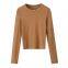 Chemise de base pour femme à manches longues avec couture au col rond en style européen et américain, nouveau style pour automne et hiver, T-shirt intérieur amincissant et ajusté.