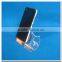 Mini universal desktop cell phone holder