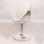 Single side free rotating stand mirror with bluetooth speaker