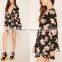 A woven floral print skater dress with long bell sleeves a plunging V-neckline side zipper