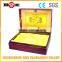 Red paper package box with yellow satin