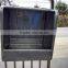 galvanized sheep hay feeder on wall