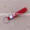 Wholesale red bracelet keychain/good quality silicone keychain with printing logo