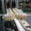 Beverage industry uplifting flexlink grip bottle conveyor