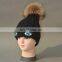 China Supplier Unisex Knitted Oxeye Embroidery Hats With Raccoon Fur Pompoms Balls Caps