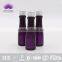 Transparent PVC plastic bottle with purple shampoo for hotel