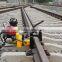 Internal combustion rail drilling machine