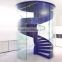 columbus circle metal spiral stair with frameless glass balustrade