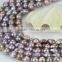 Freshwater loose pearl strand size 15mm grade AA light peacock nulceated pearl strand