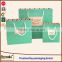 2016 china paper shop bag/clothes boutique paper shopping bag/cheap small paper gift bags with handles