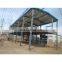 Made in china low cost multi-storey prefab insulated metal cladding steel workshop units with office building