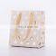 China Luxury Sacs Cadeau Dores Gold Cosmetic Paper Shopping Gift Bags Packaging