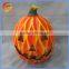 Ceramic pumpkins with halloween witch figurines